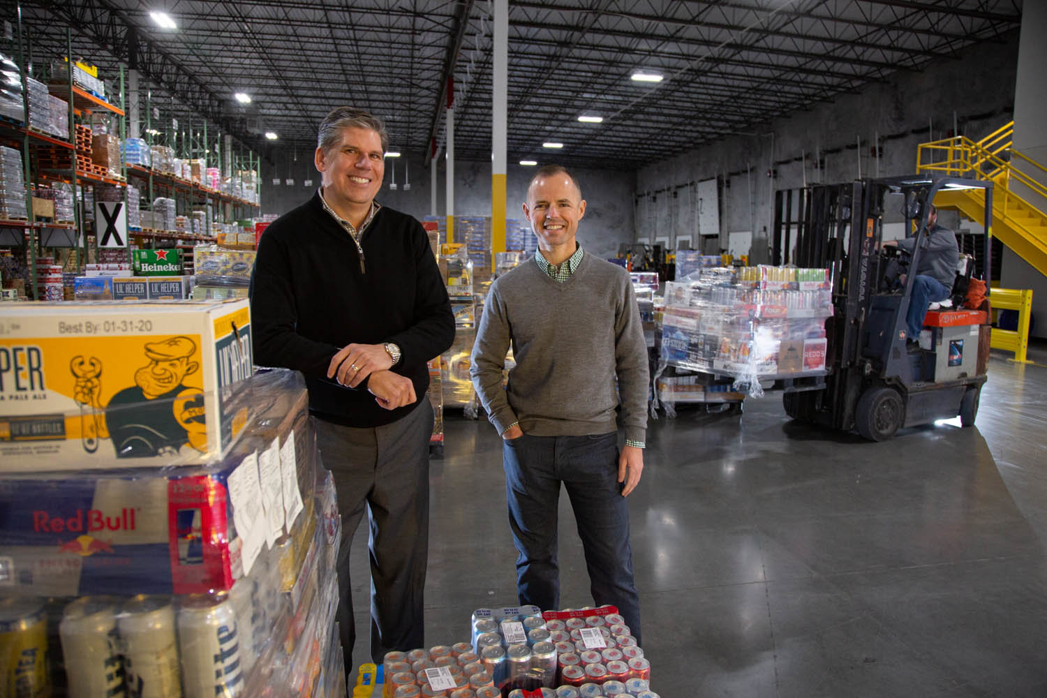 CUE THE BEER: Crews at Heart of America Beverage Co. average 385 deliveries per day, according to co-owners Brian Gelner, left, and Harwood Ferguson.